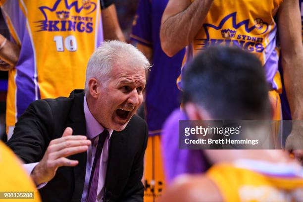 Andrew Gaze, coach of the Kings speaks to players during a time out during the round 15 NBL match between the Sydney Kings and the Perth Wildcats at...