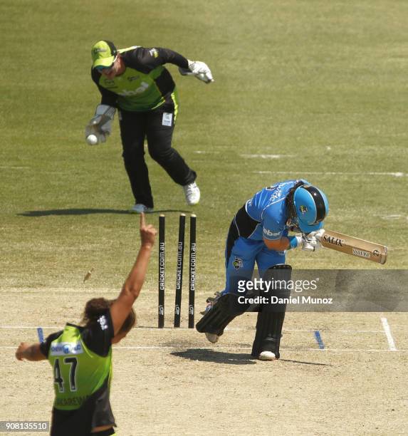 Strikers Tammy Beaumont is bowled out by Thunder Belinda Vakarewa during the Women's Big Bash League match between the Adelaide Strikers and the...