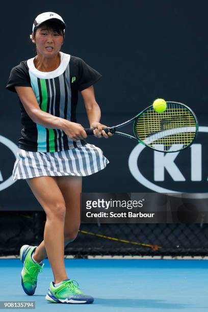 Anri Nagata of Japan plays a backhand against Diane Parry of France during the Australian Open 2018 Junior Championships at Melbourne Park on January...