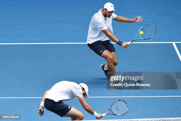 Jeremy Chardy of France and Fabrice Martin of France compete in their third round match against Bob Bryan of the United States and Mike Bryan of the...