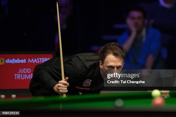 Judd Trump of England reacts during the semifinal match against Kyren Wilson of England on day seven of The Dafabet Masters at Alexandra Palace on...