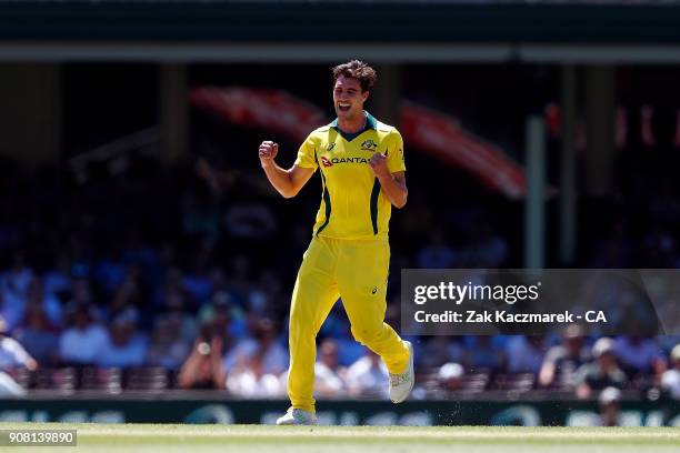 Pat Cummins of Australia celebrates after dismissing Jason Roy of England during game three of the One Day International series between Australia and...