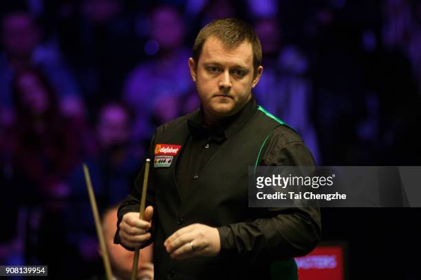 Mark Allen of Northern Ireland reacts during the semifinal match against John Higgins of Scotland on day seven of The Dafabet Masters at Alexandra...