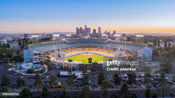 los angeles city skyline with dodger stadium - dodger stadium view stock pictures, royalty-free photos & images