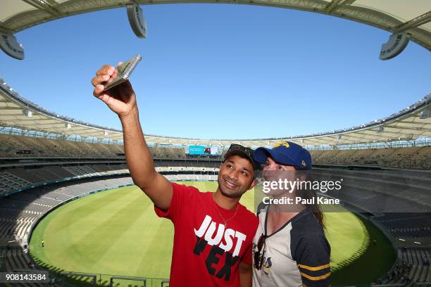 Couple pose to take a selfie at Optus Stadium on January 21, 2018 in Perth, Australia. The 60,000 seat multi-purpose Stadium features the biggest LED...