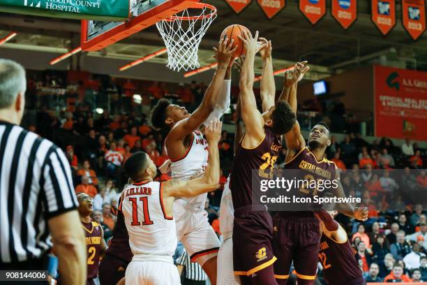 Bowling Green Falcons forward Demajeo Wiggins battles for a rebound against Central Michigan Chippewas guard Kevin McKay and Central Michigan...