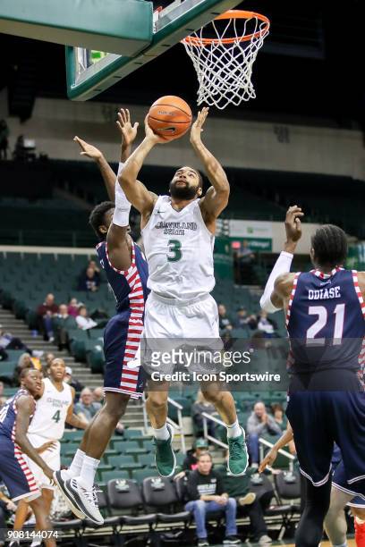 Cleveland State Vikings Dontel Highsmith shoots as UIC Flames forward/center Tai Odiase defends during the second half of the men's college...