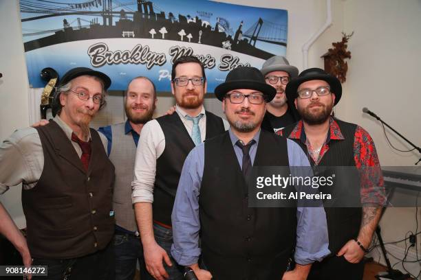 Kirk Siee, Mike Bell, Matt Laurita, Scott Wolfson, Skyler Bode and Chris Kelly of Scott Wolfson and Other Heroes pose before they perform as part of...