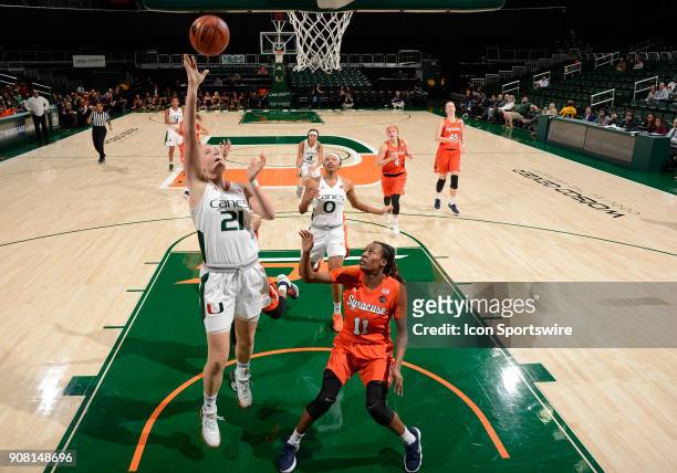 Miami forward/center Emese Hof shoots during a women's college basketball game between the Syracuse University Orange and the University of Miami...