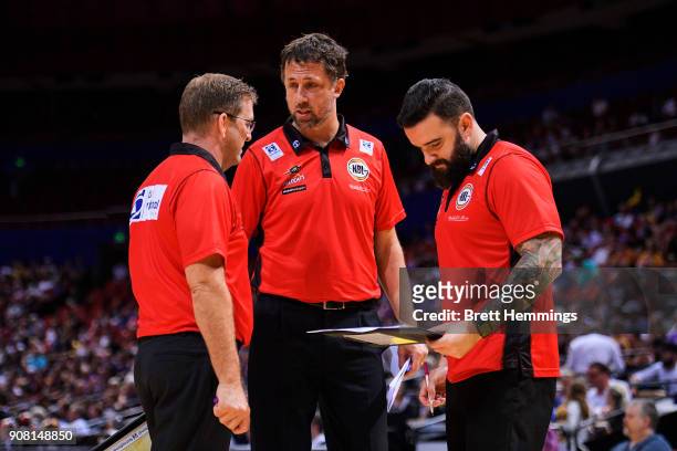Trevor Gleeson, coach of the Wildcats speaks with coaching staff during the round 15 NBL match between the Sydney Kings and the Perth Wildcats at...
