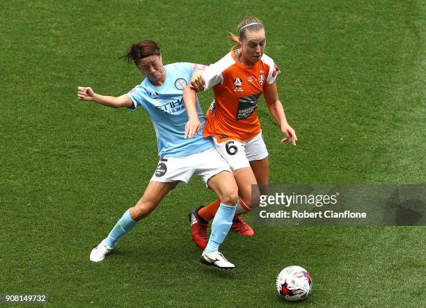 Yukari Kinga of Melbourne City challenges Celeste Boureille of the Roar during the round 12 W-League match between Melbourne City and the Brisbane...