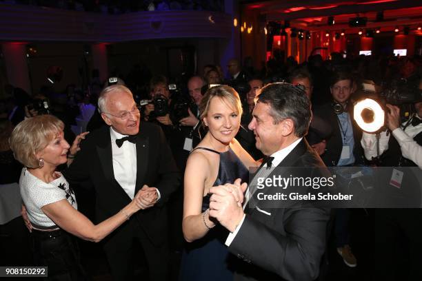 Edmund Stoiber and his wife Karin Stoiber and Sigmar Gabriel and his wife Anke Stadler dance during the German Film Ball 2018 at Hotel Bayerischer...