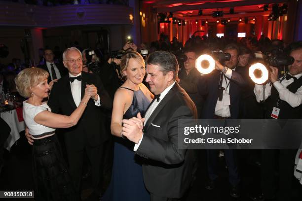 Edmund Stoiber and his wife Karin Stoiber and Sigmar Gabriel and his wife Anke Stadler dance during the German Film Ball 2018 at Hotel Bayerischer...