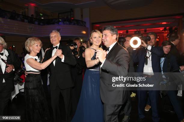 Edmund Stoiber and his wife Karin Stoiber and Sigmar Gabriel and his wife Anke Stadler dance during the German Film Ball 2018 at Hotel Bayerischer...