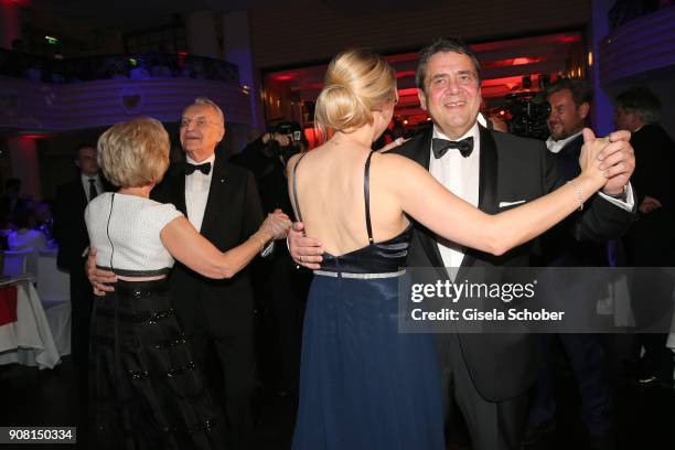 Edmund Stoiber and his wife Karin Stoiber and Sigmar Gabriel and his wife Anke Stadler dance during the German Film Ball 2018 at Hotel Bayerischer...