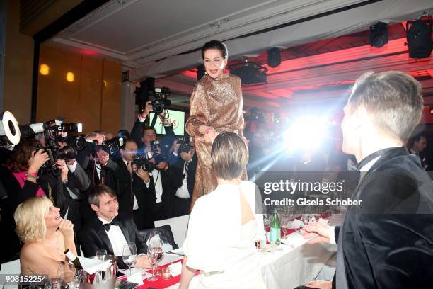 Hannelore Elsner steps on the table during the German Film Ball 2018 party at Hotel Bayerischer Hof on January 20, 2018 in Munich, Germany.