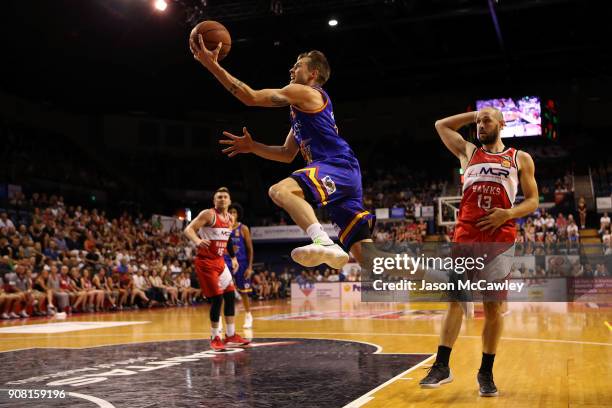 Nathan Sobey of the 36ers drives to the basket during the round 15 NBL match between the Illawarra Hawks and Adelaide United at Wollongong...