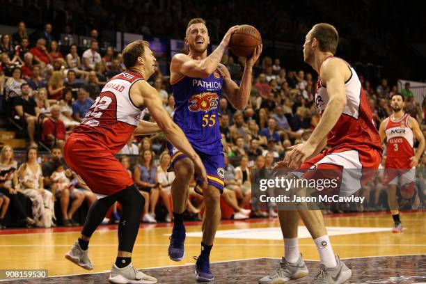 Mitchell Creek of the 36ers drives to the basket during the round 15 NBL match between the Illawarra Hawks and Adelaide United at Wollongong...