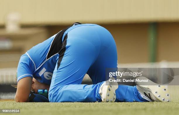 Strikers Bridget Patterson reacts after missing a catch during the Women's Big Bash League match between the Adelaide Strikers and the Sydney Thunder...