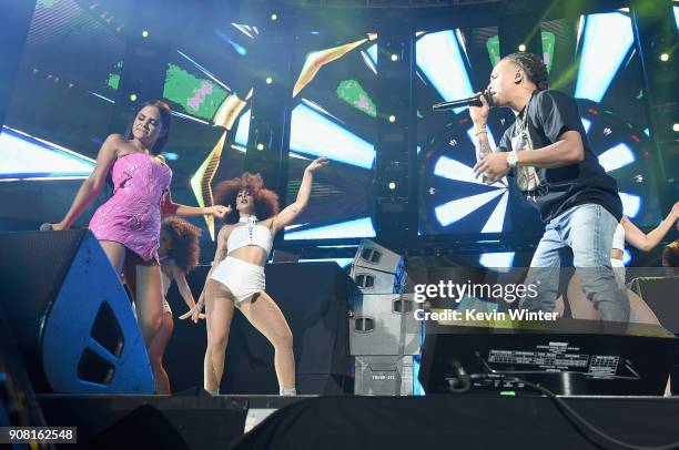 Natti Natasha and Ozuna perform onstage during Calibash Los Angeles 2018 at Staples Center on January 20, 2018 in Los Angeles, California.