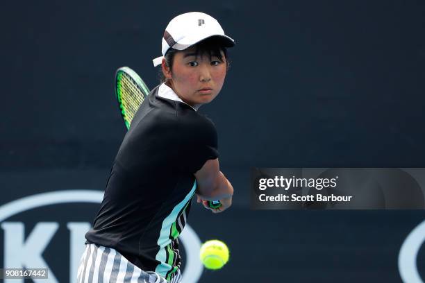 Anri Nagata of Japan plays a backhand against Diane Parry of France during the Australian Open 2018 Junior Championships at Melbourne Park on January...
