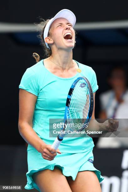 Elise Mertens of Belgium celebrates winning her fourth round match against Petra Martic of Croatia on day seven of the 2018 Australian Open at...
