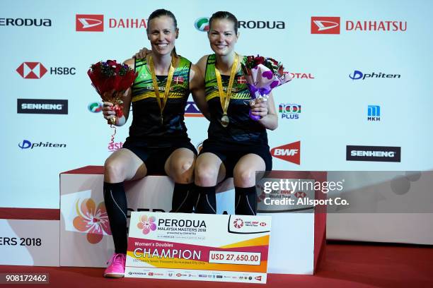 Kamil Rytter Juhl and Christinna Pedersen of Denmark pose with their gold medals after winning in the Women's Doubles Final during the Perodua...