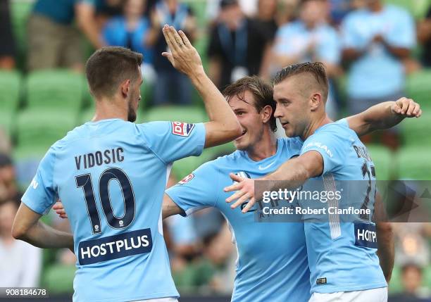 Marcin Budzinski of the City celebrates scoring his second goal during the round 17 A-League match between Melbourne City and Adelaide united at AAMI...