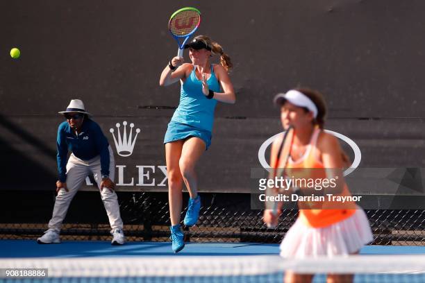 Elysia Bolton of the United States and Nicole Mossmer of the United States in their doubles match against Alexa Noel of the United States and Rina...
