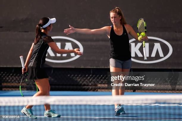 Alexa Noel of the United States and Rina Saigo of Japan in their doubles match against Elysia Bolton of the United States and Nicole Mossmer of the...