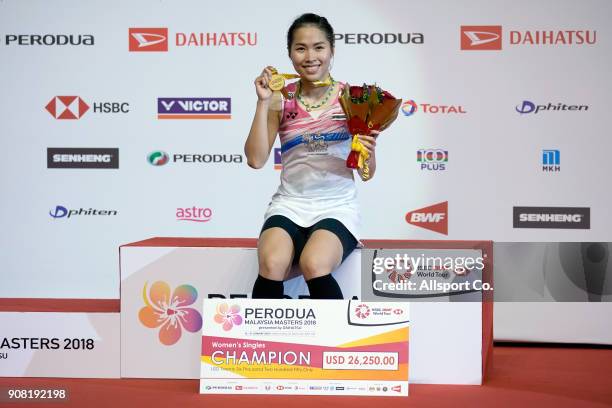 Ratchanok Intanon of Thailand poses with her gold medal after she defeated Tai Tzu Ying of Chninese Taipei during the Women's Singles Final during...