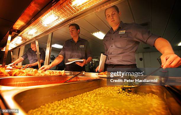 The ships crew eat lunch onboard HMS Ark Royal on September 15, 2009 in Portsmouth, England. The Royal Navy's flag ship HMS Ark Royal, which first...