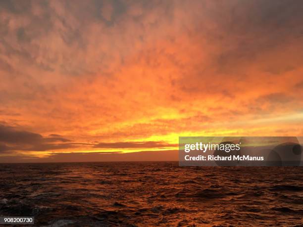 sunrise near saunders island. - manus island stock pictures, royalty-free photos & images