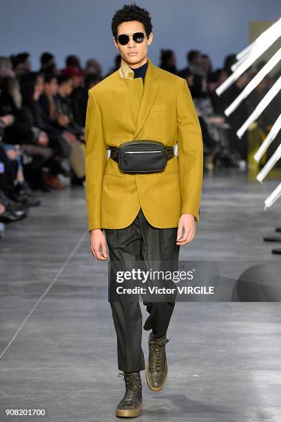 Model walks the runway during the Cerruti 1881 Menswear Fall/Winter 2018-2019 show as part of Paris Fashion Week on January 19, 2018 in Paris, France.