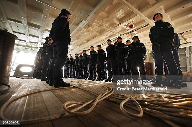 Ark Royal crew members muster on the quarter deck on September 15, 2009 in Portsmouth, England. The Royal Navy's flag ship HMS Ark Royal, which first...