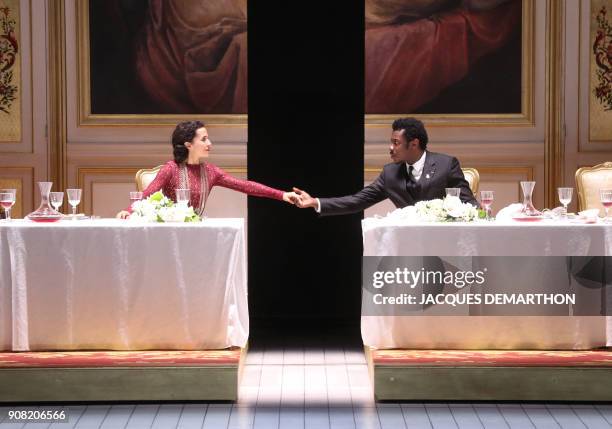 Actors Chloe Rejo as Lady Macbeth and Adama Diop as Macbeth perform on stage during a dress rehearsal of the play 'Macbeth' by English playwright...