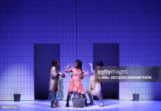 Actresses portraying the three witches perform on stage during a dress rehearsal of the play 'Macbeth' by English playwright William Shakespeare and...