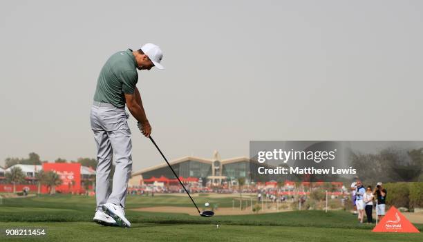 Ross Fisher of England plays his shot from the 18th tee during the final round of the Abu Dhabi HSBC Golf Championship at Abu Dhabi Golf Club on...