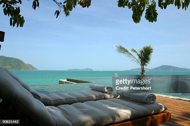 relaxing ocean view beach scene - private island stock pictures, royalty-free photos & images
