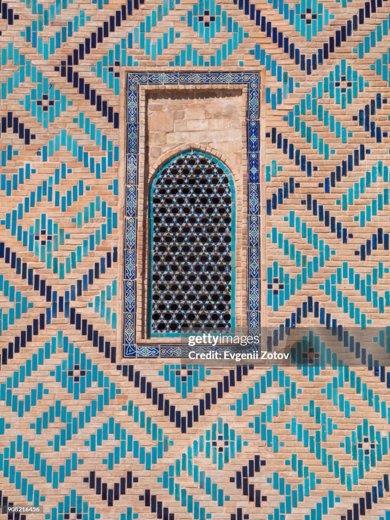 Close-up image of tiled wall of Mausoleum of Khoja Ahmed Yasawi in Turkistan city, Kazakhstan