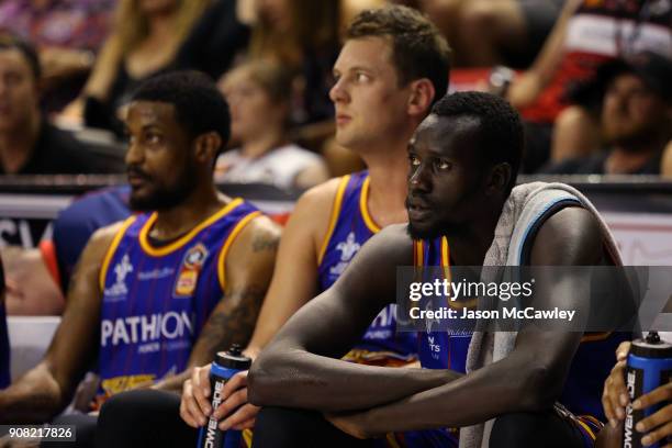 Majok Deng of the 36ers looks on from the bench during the round 15 NBL match between the Illawarra Hawks and Adelaide United at Wollongong...