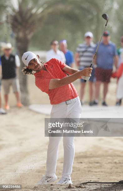 Tommy Fleetwood of England plays his second shot on the 13th hole during the final round of the Abu Dhabi HSBC Golf Championship at Abu Dhabi Golf...