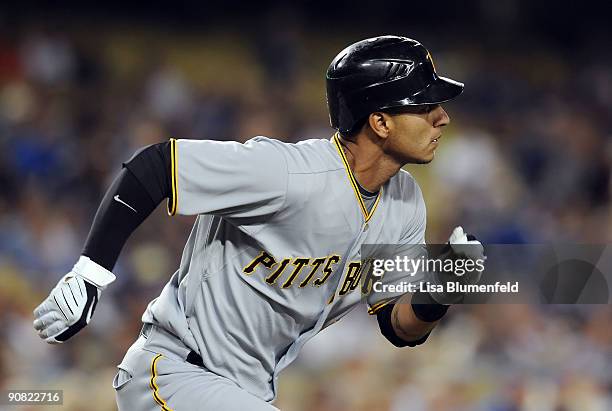 Ronny Cedeno of the Pittsburgh Pirates hits a double in the second inning against the Los Angeles Dodgers at Dodger Stadium on September 15, 2009 in...