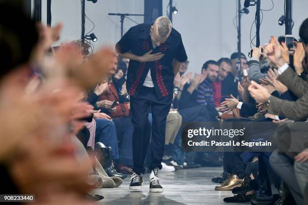 Designer Lucas Ossendrijver acknowledges applause on the runway during the Lanvin Menswear Fall/Winter 2018-2019 show as part of Paris Fashion Week...