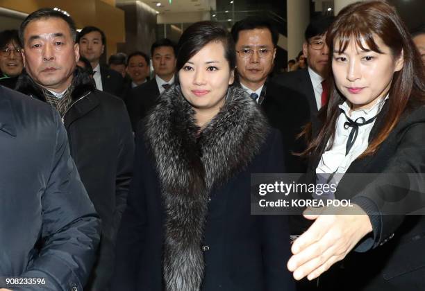 Hyon Song-Wol , the leader of North Korea's popular Moranbong band, leaves after visiting the Gangneung Arts Center where one of the planned musical...