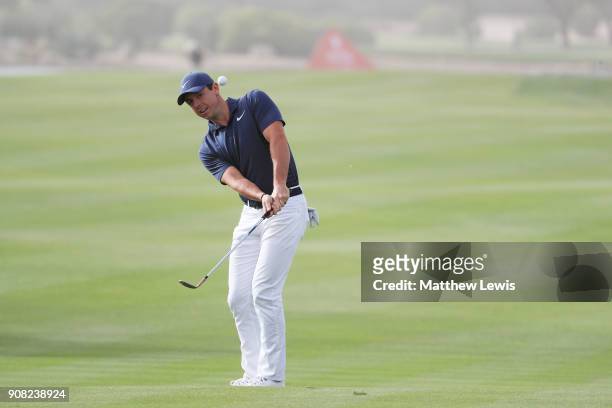 Rory McIlroy of Northern Ireland plays his third shot on the 14th hole during the final round of the Abu Dhabi HSBC Golf Championship at Abu Dhabi...