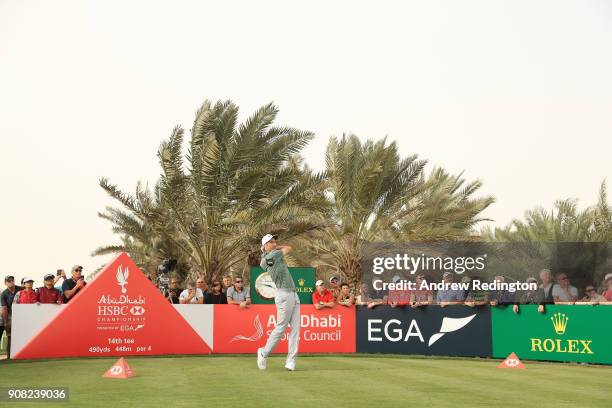 Ross Fisher of England plays his shot from the 14th tee during the final round of the Abu Dhabi HSBC Golf Championship at Abu Dhabi Golf Club on...