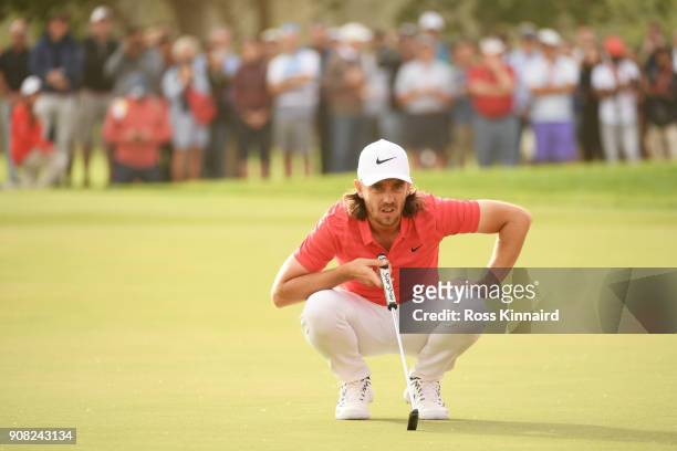 Tommy Fleetwood of England lines up a putt on the 17th green during the final round of the Abu Dhabi HSBC Golf Championship at Abu Dhabi Golf Club on...