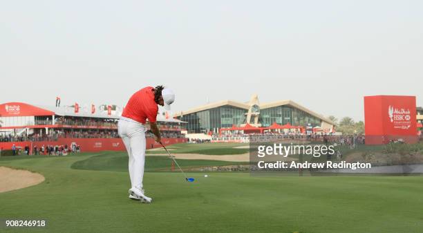 Tommy Fleetwood of England plays his second shot on the 18th hole during the final round of the Abu Dhabi HSBC Golf Championship at Abu Dhabi Golf...