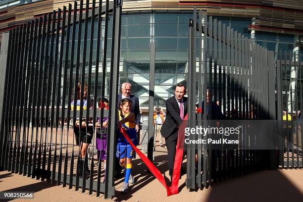 Mark McGowan opens the gate with young children together with Mick Murray and Colin Barnett before cutting the ribbon to officially open Optus...